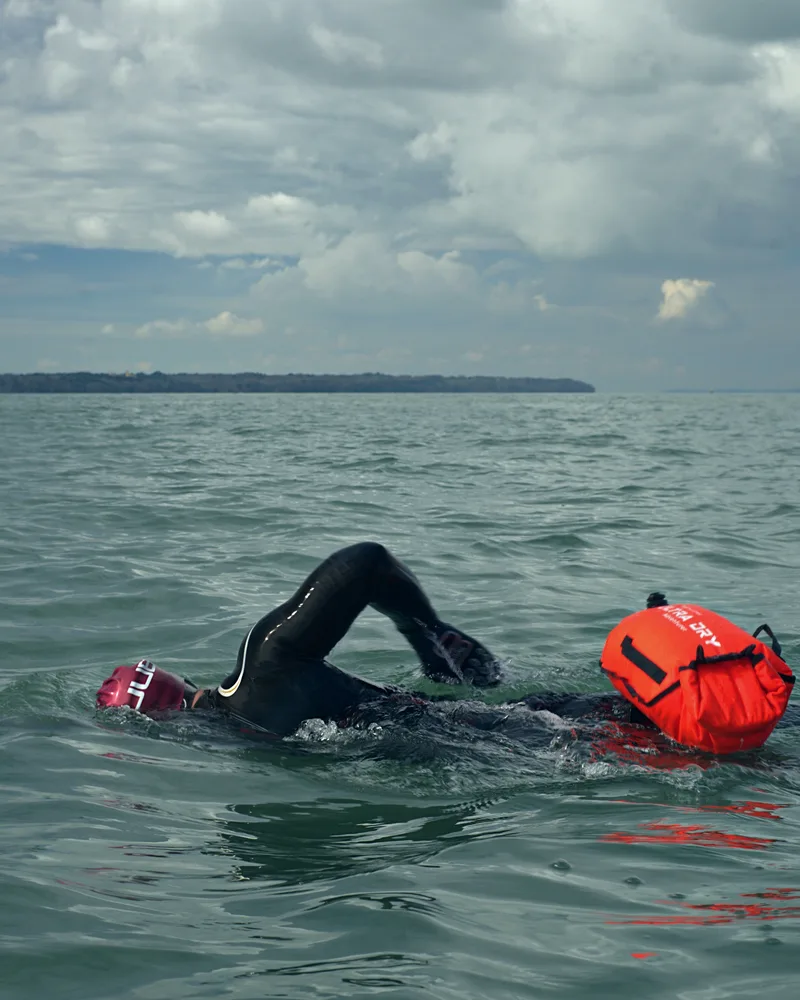 Lance swimming front crawl in open water across the Solent